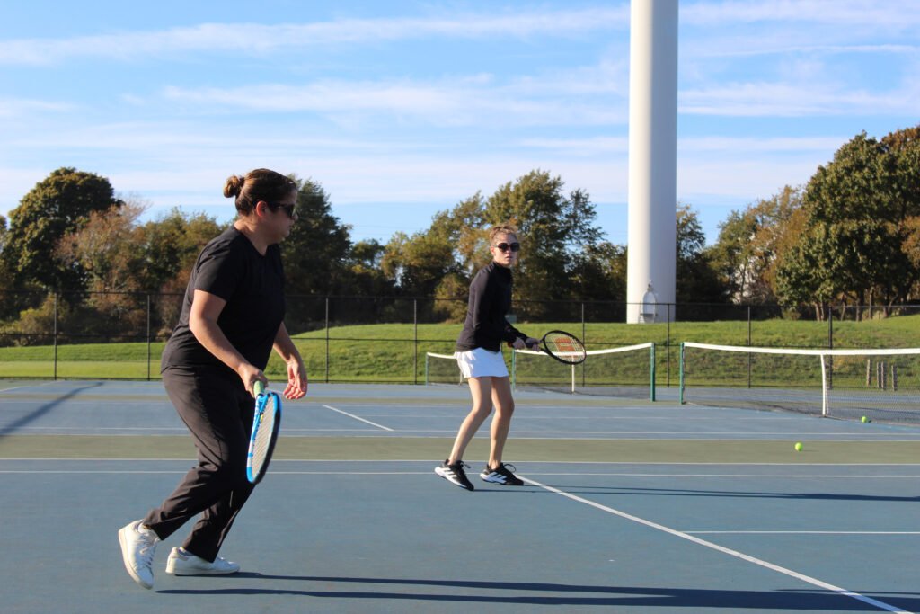 Imogen Saiz Adult Group Tennis Lessons Clinics Rhode Island RI - Photo by Taryn de Meillon