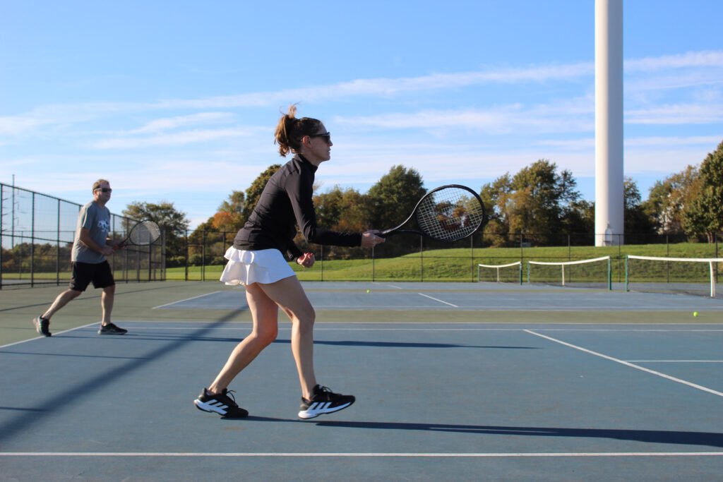 Imogen Saiz Adult Group Tennis Lessons Clinics Rhode Island RI - Photo by Taryn de Meillon