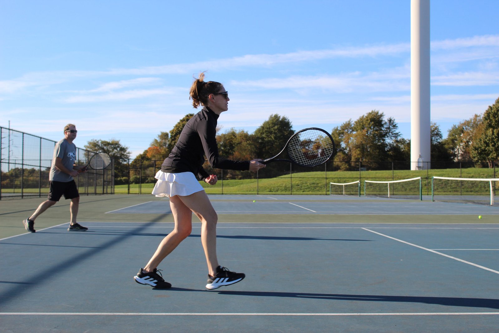 Imogen Saiz Adult Group Tennis Lessons Clinics Rhode Island RI - Photo by Taryn de Meillon
